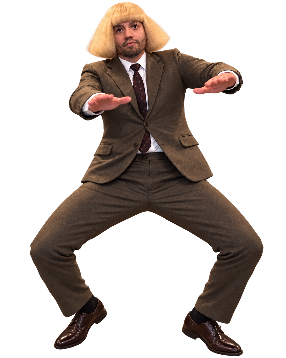 Oscar in a blonde wig and suit, striking a funny dance pose.