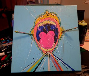 Original colorful mouth painting with pencils and flowing paint.