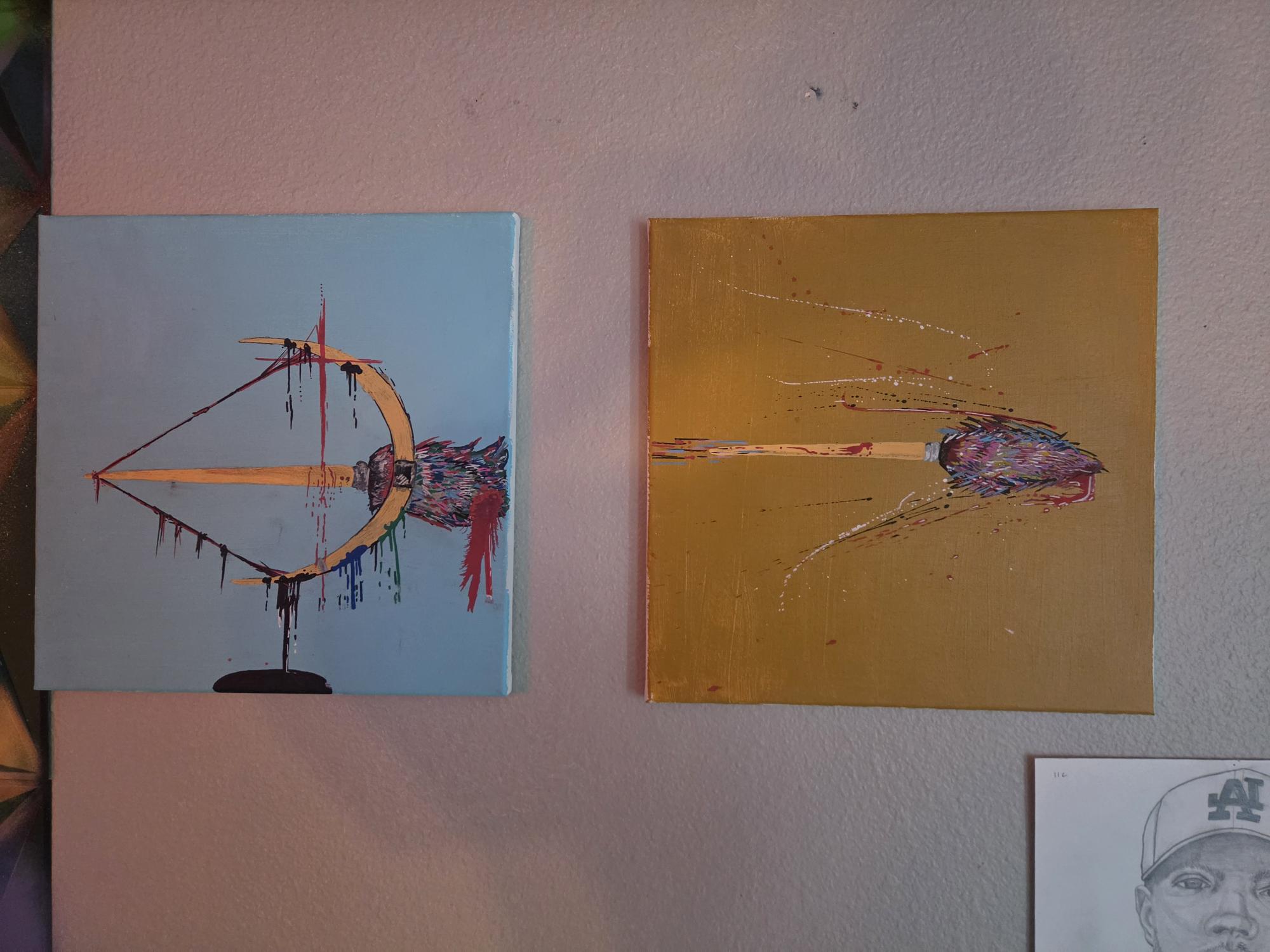 Two original paintings with sculptural lines on blue and gold canvases.